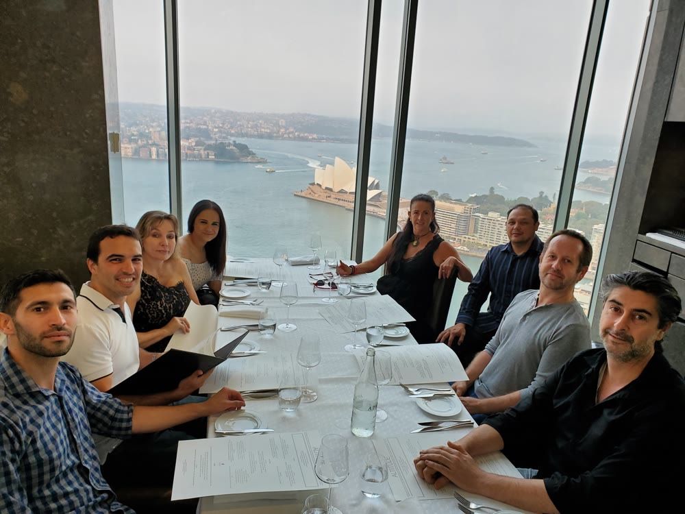 The Prodocom team at a Sydney harbour dinner celebrating years of growth